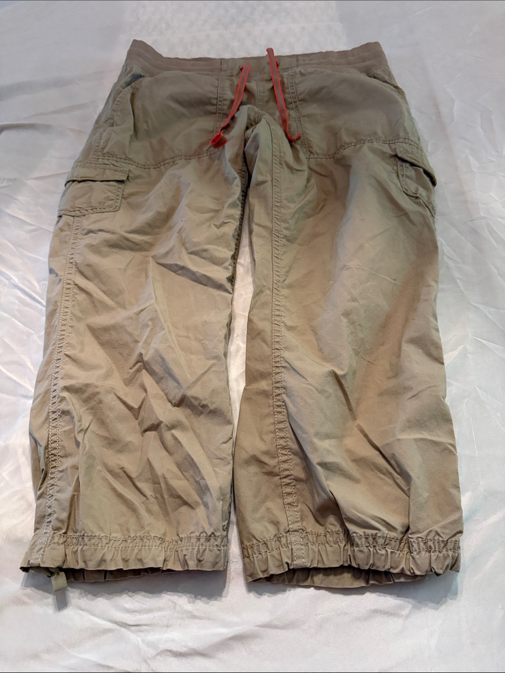 The North Face Women's Cropped Cargo Pants in Khaki with Red Drawstring